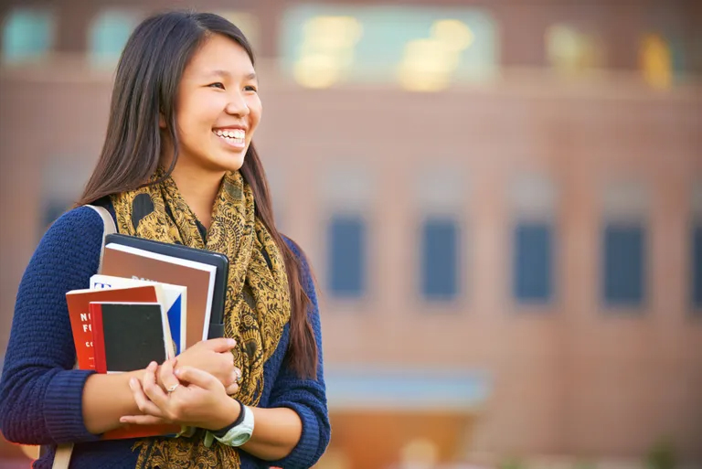 international-student-holding-books