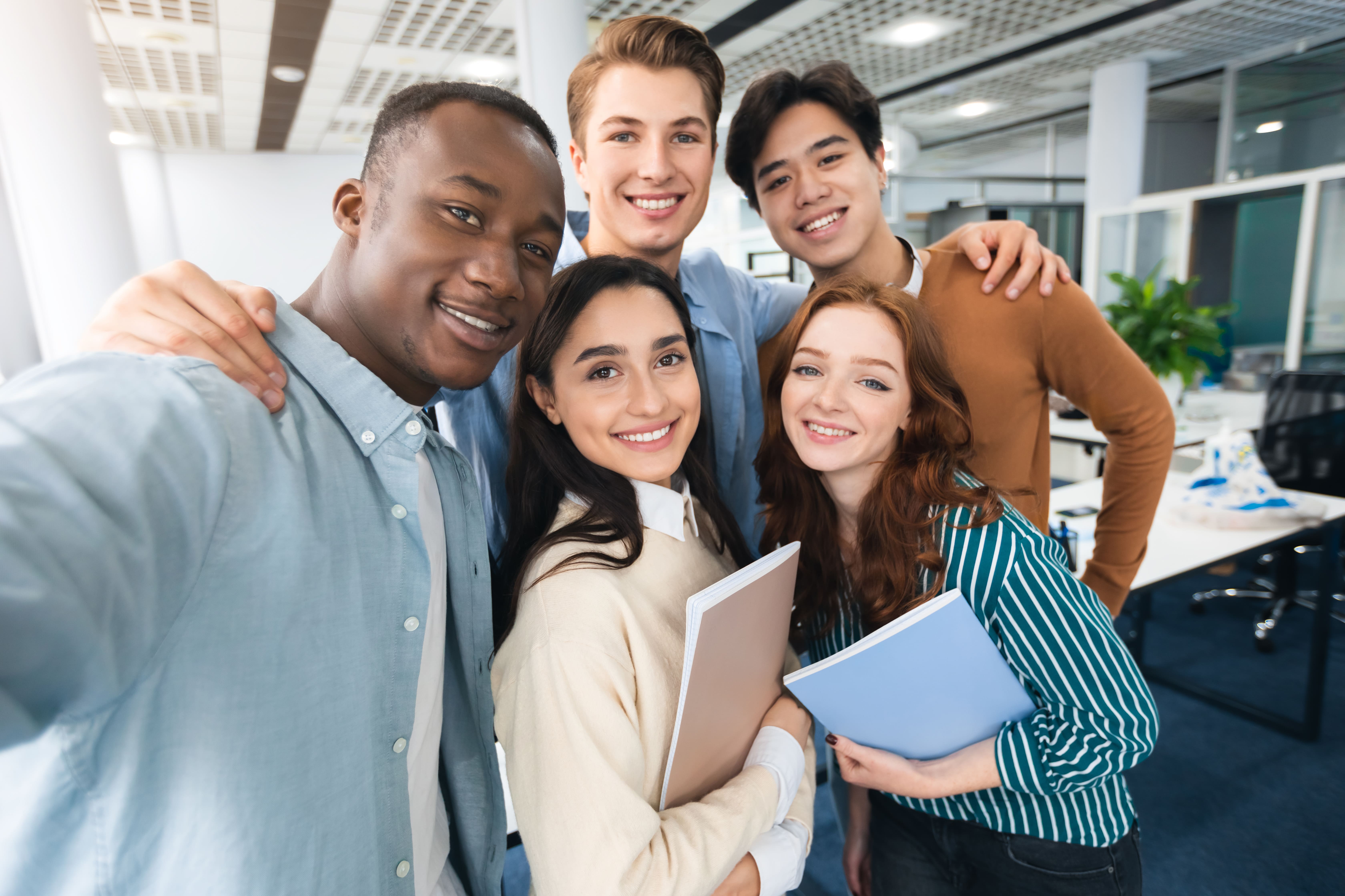 happy-international-students-taking-selfie-in-univ-2022-12-16-07-34-20-utc