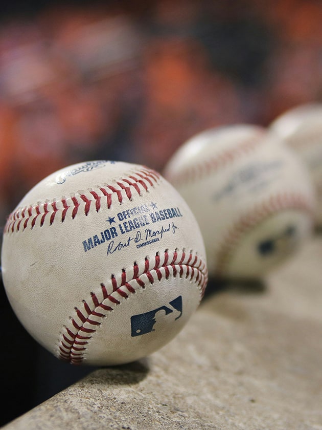 An image of three baseballs lined up. Sports fans can watch Major League Baseball games at Space Coast Stadium in Melbourne, Florida, USA near ELS Language Centers.